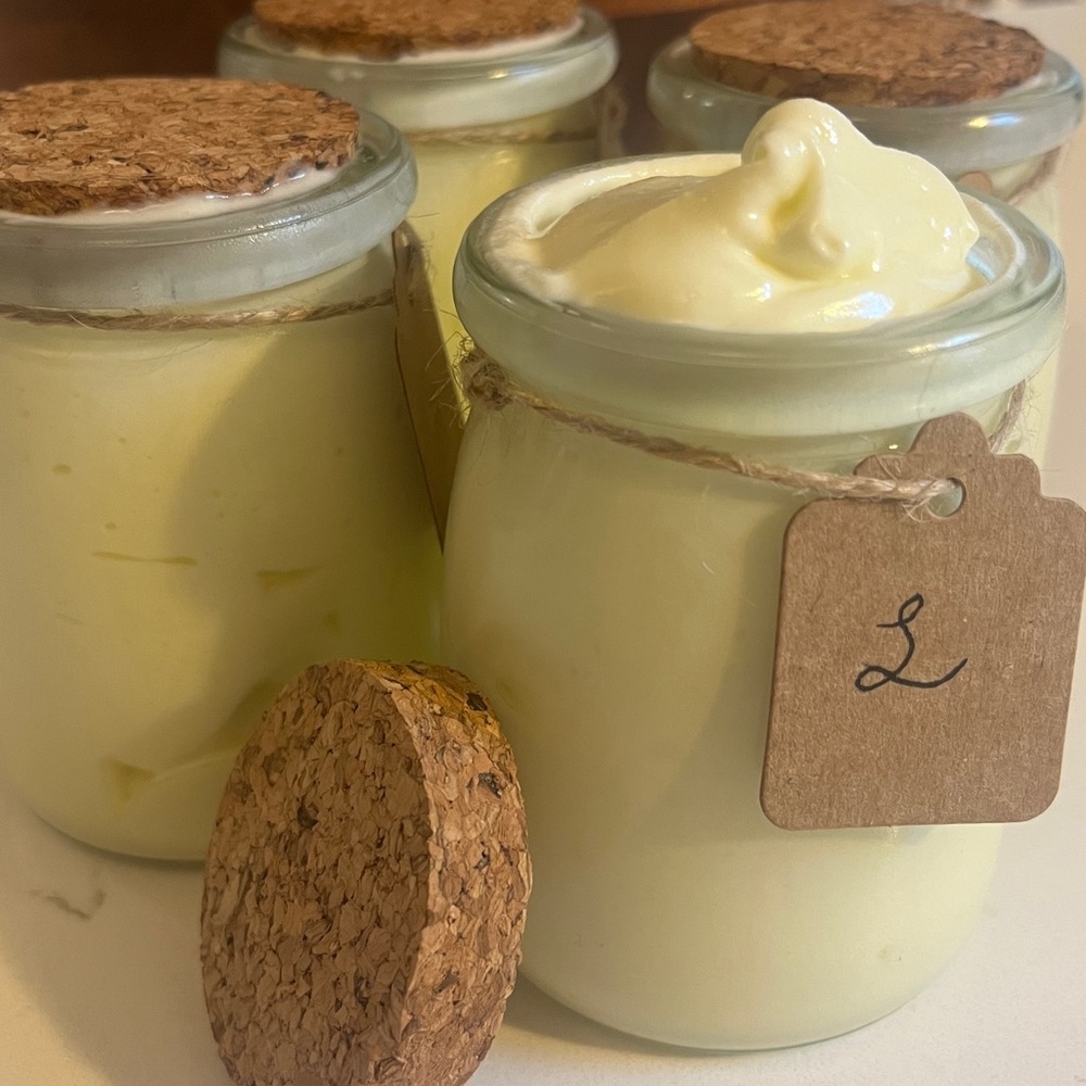 White Moisturizer & Body Oil in Clear Glass Jars with Cork Lids